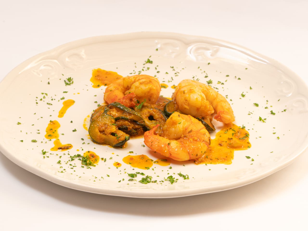 Curry di gamberoni con zucchine