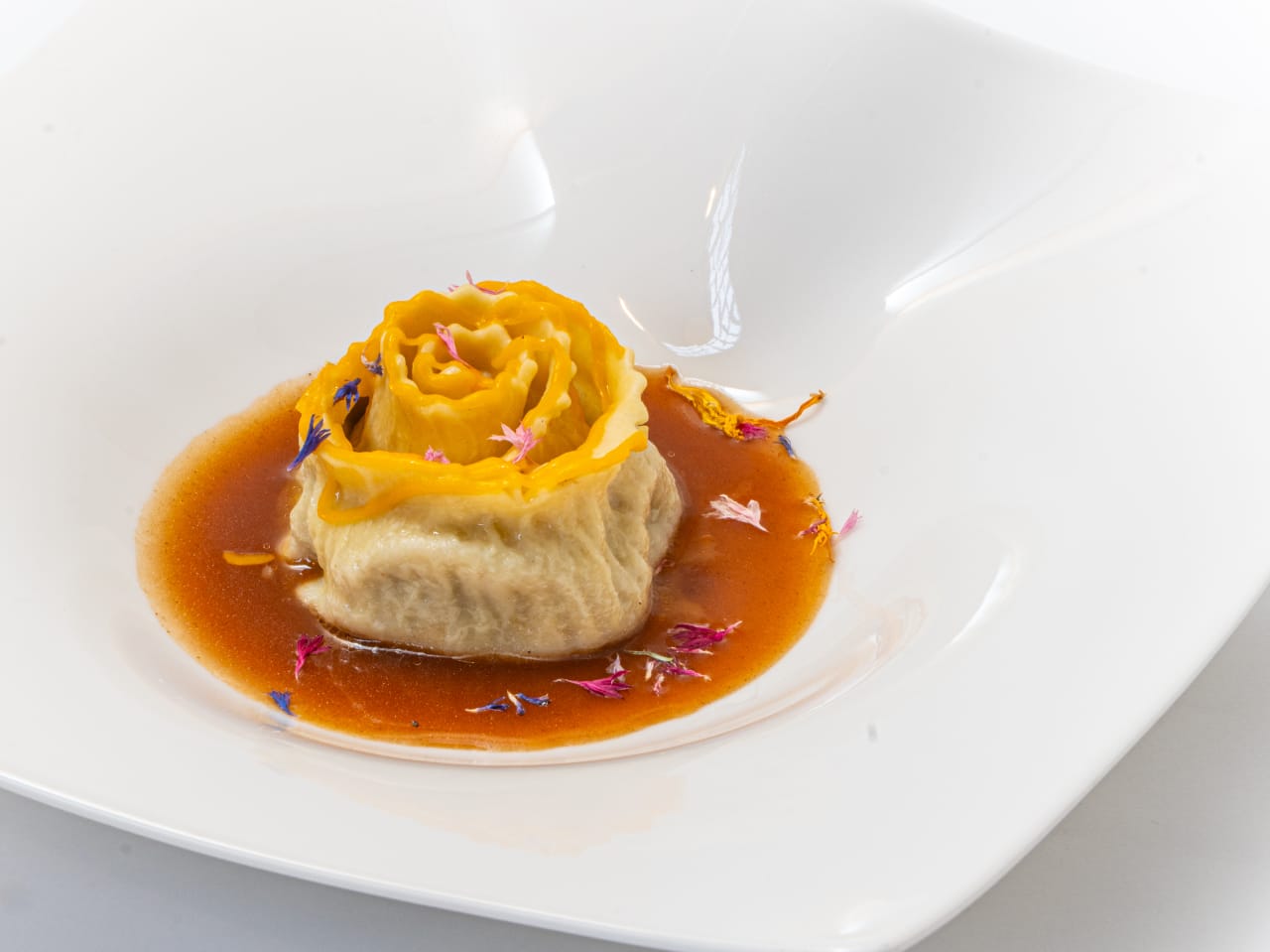 Tagliatelle ripiene di marmotta con leggero fondo di cacciagione